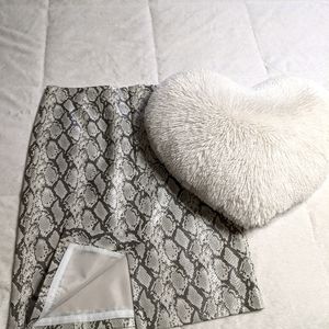 Snake print pencil skirt.